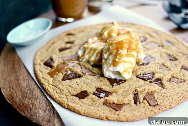Final top-down shot of the double chocolate chunk share cookie with melted ice cream and caramel