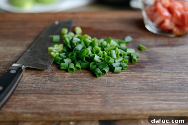 Slicing green onions for BLAT salad