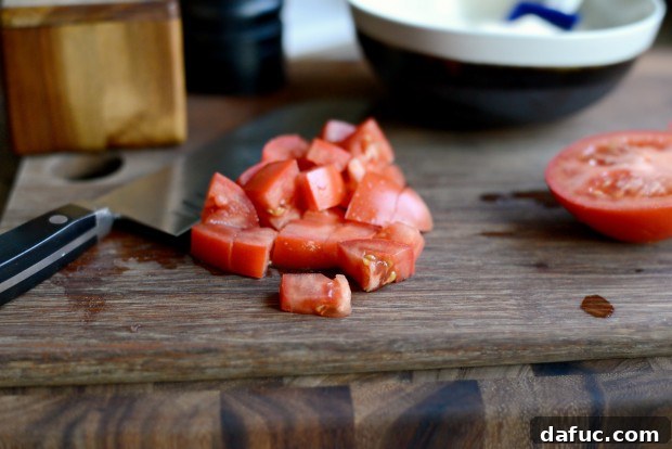Preparation of BLAT salad dressing: chopped tomatoes and mayonnaise