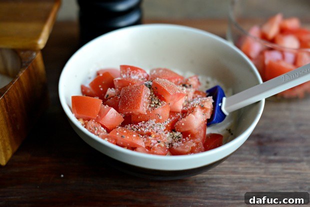 Combining mayonnaise with chopped tomatoes for BLAT dressing