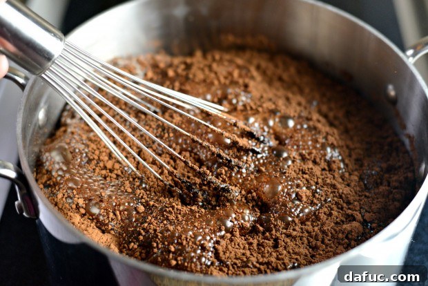 Whisking in cocoa powder