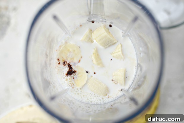 Chocolate Banana Bliss 6 Adding homemade chocolate syrup to the blender