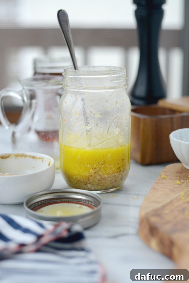 Lemon Vinaigrette bottle with fresh ingredients