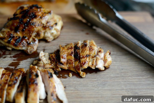 Sweet & Tangy Teriyaki Chicken Bowls 22 Resting chicken - grilled chicken thighs resting on a cutting board