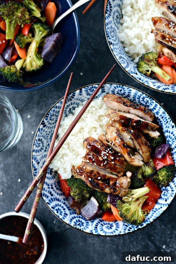 Sweet & Tangy Teriyaki Chicken Bowls 25 Close-up of Teriyaki Chicken Rice Bowl, showcasing texture of chicken and rice