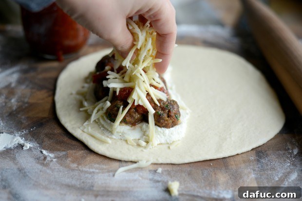 Folding calzone dough over filling