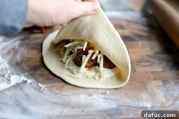 Pressing calzone edges together