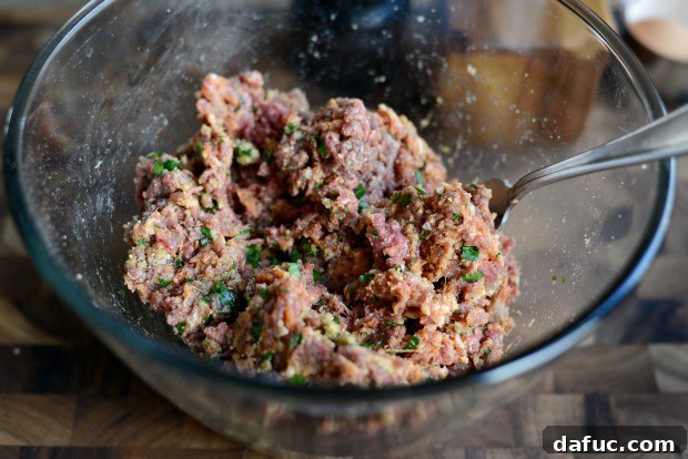 Combining meatball ingredients with a fork