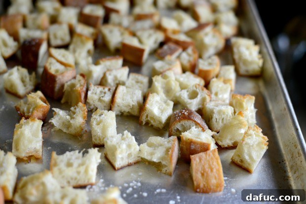 Fresh Kale Caesar with Light Caesar Dressing 20 Golden brown ciabatta croutons baking in the oven.