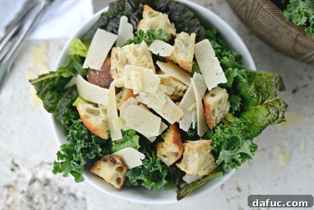 Fresh Kale Caesar with Light Caesar Dressing 24 Empty serving bowls ready for salad assembly.