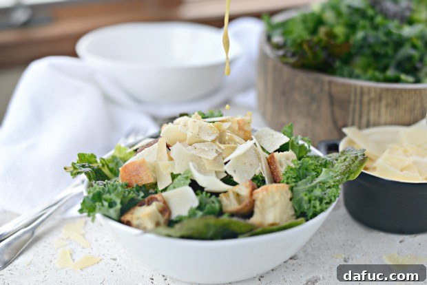 A Light Take on Kale Caesar Salad 25 Drizzling light Caesar vinaigrette over salad