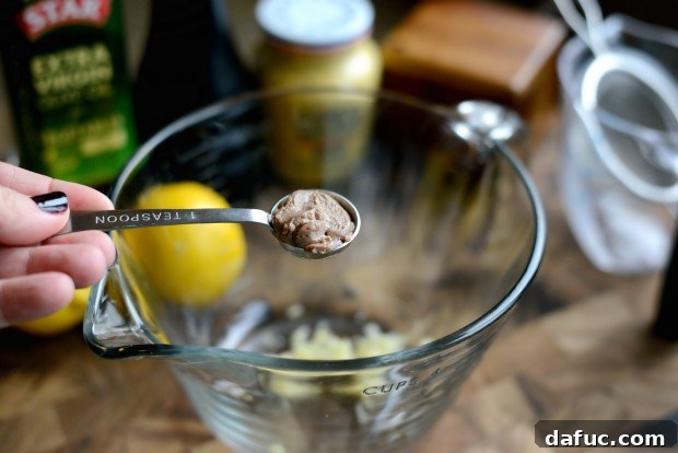 A Light Take on Kale Caesar Salad 8 Anchovy paste is crucial for authentic Caesar flavor