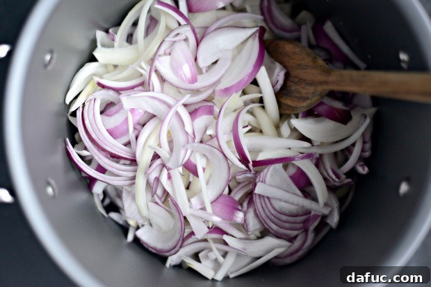 Adding Sliced Onions to Melted Butter