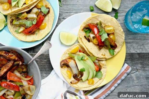Delicious Portobello Fajitas served in warm corn tortillas with fresh toppings
