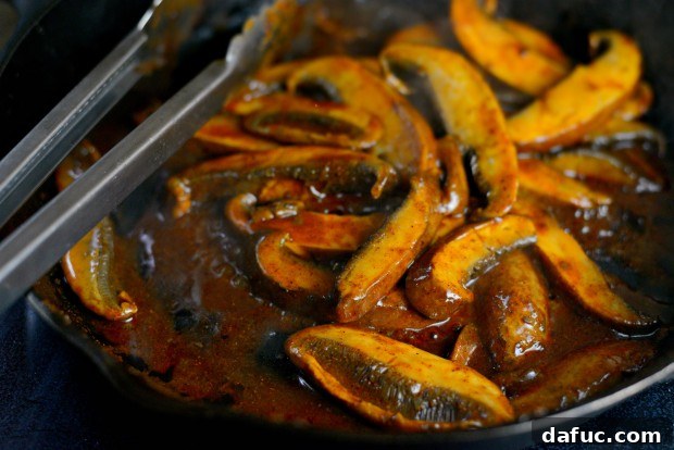 Cooked portobello mushrooms removed from heat, ready for assembly
