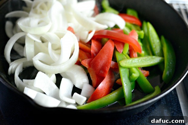 Slicing bell peppers and onions for Portobello Fajitas