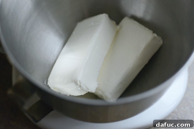 Ultimate Classic Cream Cheese Frosting 5 Softened cream cheese in a stand mixer bowl