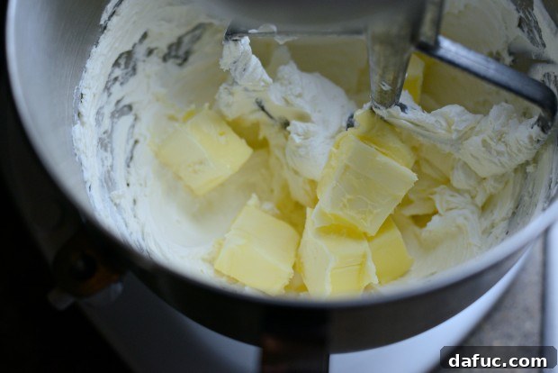 Ultimate Classic Cream Cheese Frosting 7 Adding butter to creamed cream cheese