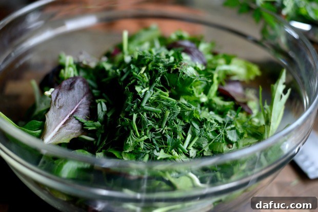 Shaved Raw Sweet Potato and Creamy Avocado Salad with Miso Dressing 12 Tossing mixed spring greens with baby spinach and chopped fresh herbs for the salad base.