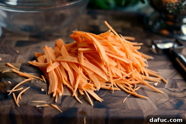 Shaved Raw Sweet Potato and Creamy Avocado Salad with Miso Dressing 14 Julienned raw sweet potato strips, ready to add crunch and nutrition to the salad.