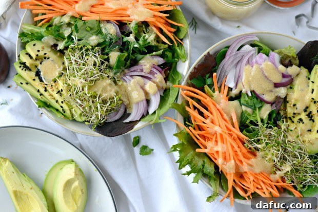 Shaved Raw Sweet Potato and Creamy Avocado Salad with Miso Dressing 17 Avocado and Raw Sweet Potato Salad with Miso Dressing - A close-up of a single serving, showcasing the fresh ingredients.