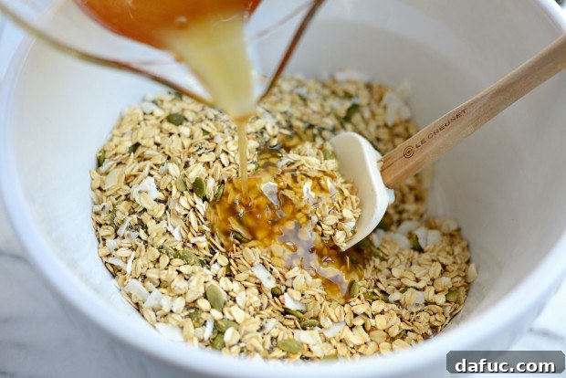 Tropical Coconut Chia Granola 10 Combining dry ingredients for Coconut Chia Granola
