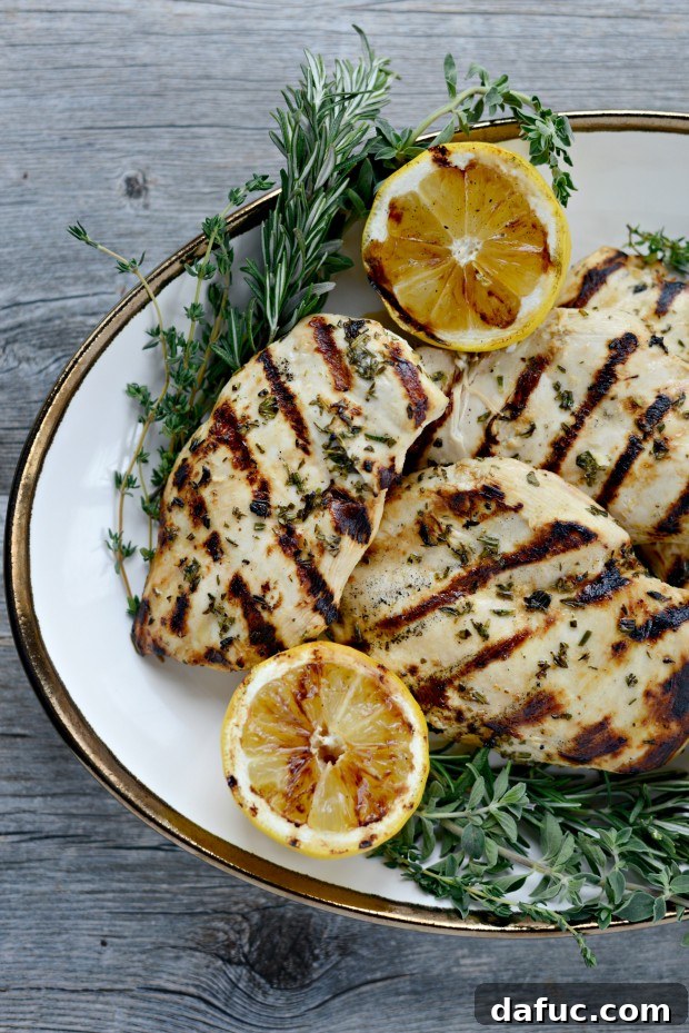 Zesty Grilled Greek Chicken 3 Grilling Greek Chicken on a beautiful day, showcasing the outdoor cooking experience
