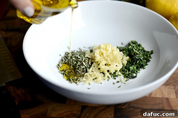 Zesty Grilled Greek Chicken 10 All minced fresh herbs gathered in a bowl