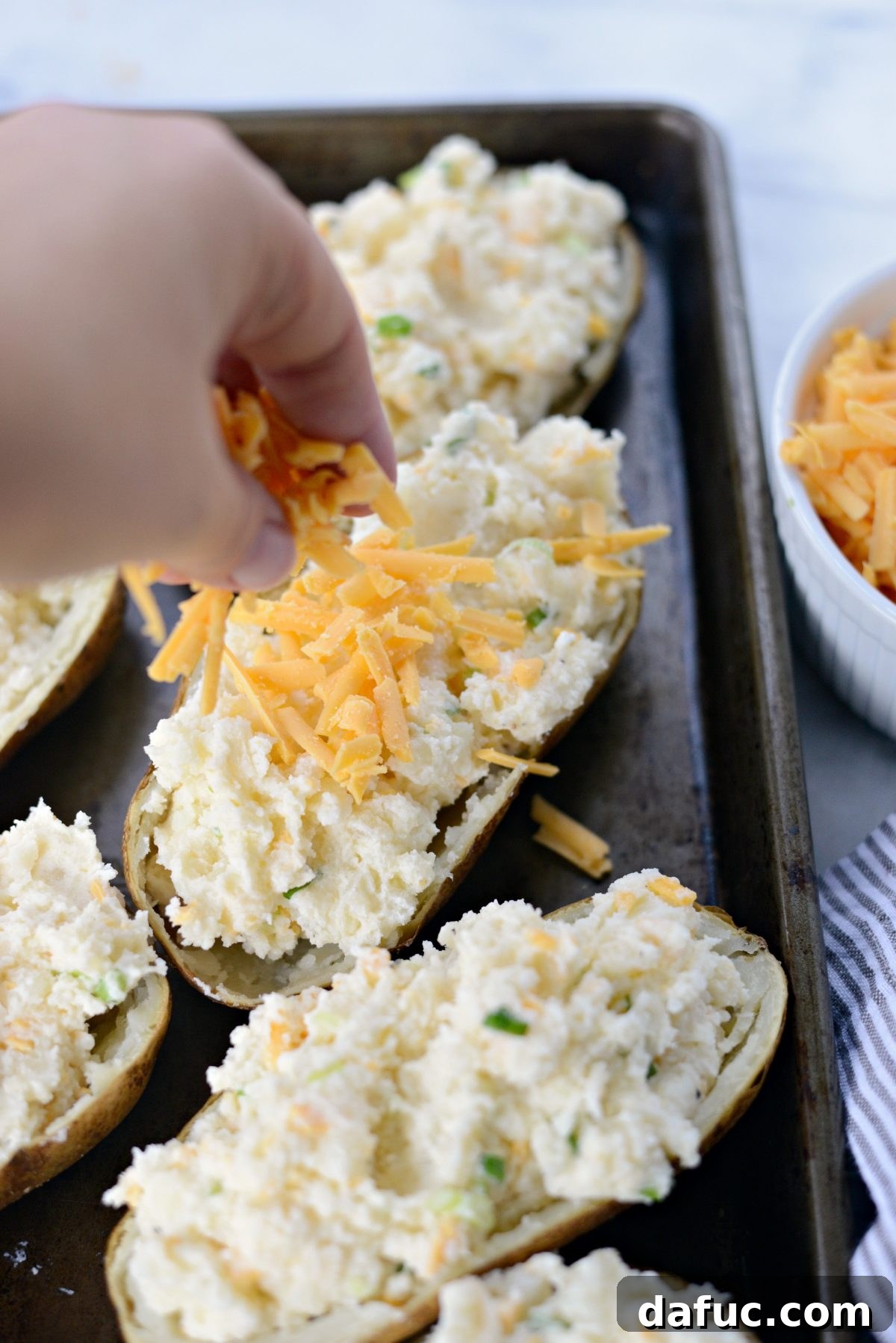 Decadent Double-Baked Potato Delight 11 Loaded potato skins topped with a generous layer of cheddar cheese