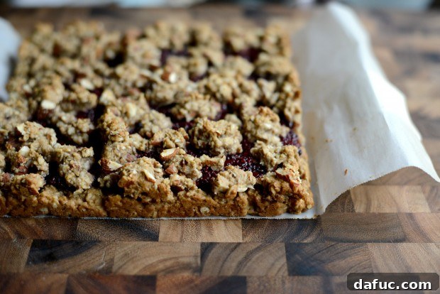 Sweet Cherry Almond Crumble Bars 21 Cherry Jam Almond Crumble Breakfast Bars cooling in the pan