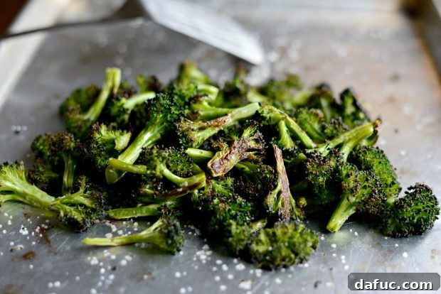 Savory Roasted Broccoli with Toasted Peanuts 11 Roasted broccoli fresh out of the oven, showing crispy, charred florets.