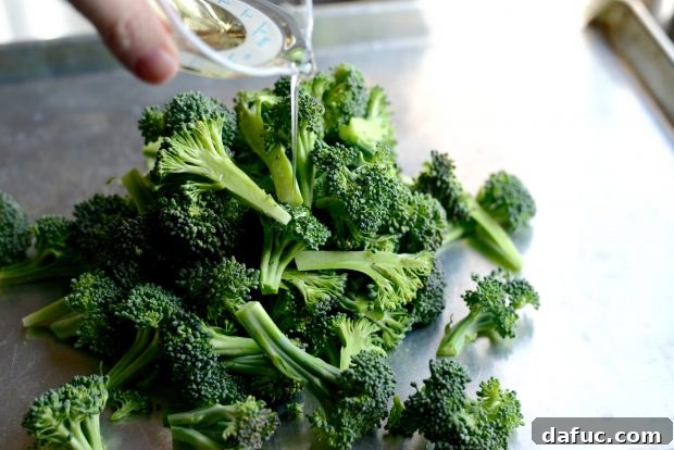 Savory Roasted Broccoli with Toasted Peanuts 5 A close-up of fresh broccoli florets with some stem attached, ready for preparation.