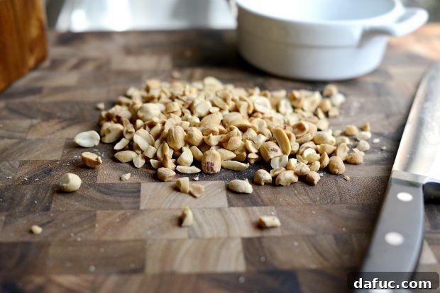 Savory Roasted Broccoli with Toasted Peanuts 8 A small bowl containing 1.5 tablespoons of nutritional yeast flakes.