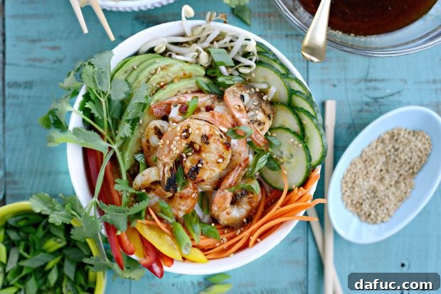 Vibrant Grilled Shrimp Spring Roll Noodle Bowls 14 A close-up shot of the grilled shrimp in a spring roll noodle bowl, highlighting the fresh ingredients.