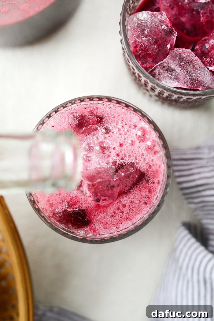 Topping glasses with sparkling water