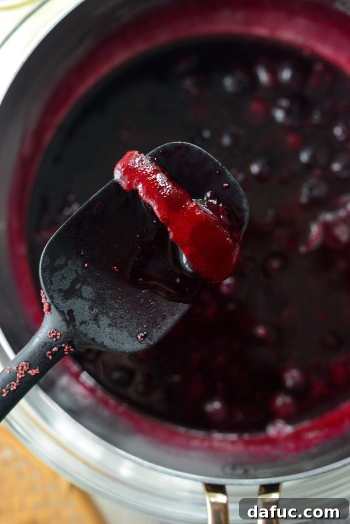 Removing lemon rinds from the cooled blueberry mixture