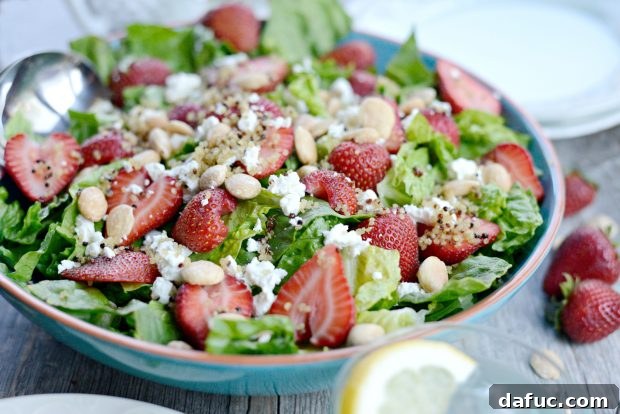 Sweet Strawberry and Creamy Goat Cheese Salad with Crispy Quinoa 16 Assembled Strawberry Goat Cheese Salad on a plate