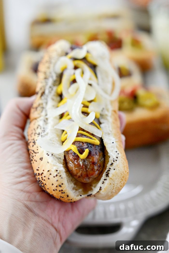 Platter of Oven Braised Beer Brats with various side dishes