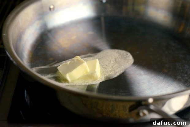 Melting butter in a deep skillet