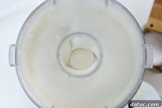 Creamy Lebanese Toum 15 Toum almost fully emulsified.