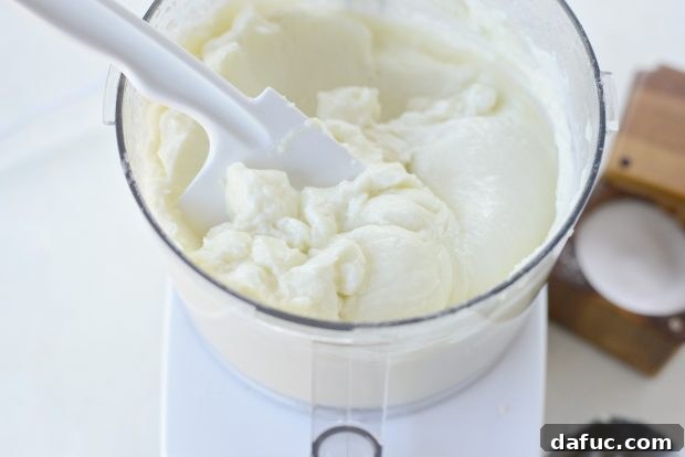Creamy Lebanese Toum 17 Scoop of fluffy Toum.
