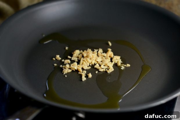 Sautéing Garlic in Olive Oil for the Fiesta Topping