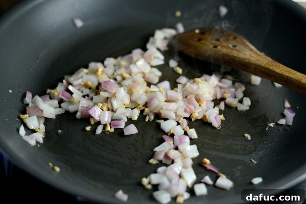 Grilled Red Snapper with a Vibrant Fiesta Olive Medley 8 Red onion sautéing in the skillet until tender and translucent.
