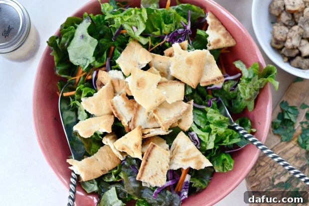 Toasted pita pieces, essential for the crunch in Chicken Tawook Salad
