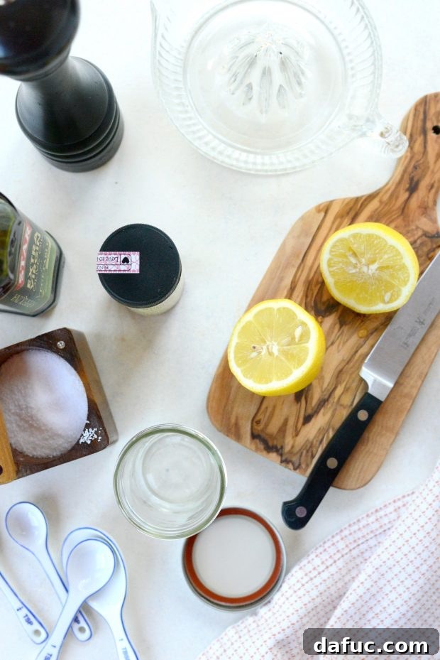 Ingredients for homemade Lemon Sumac Dressing: sumac, lemon juice, olive oil, salt, pepper