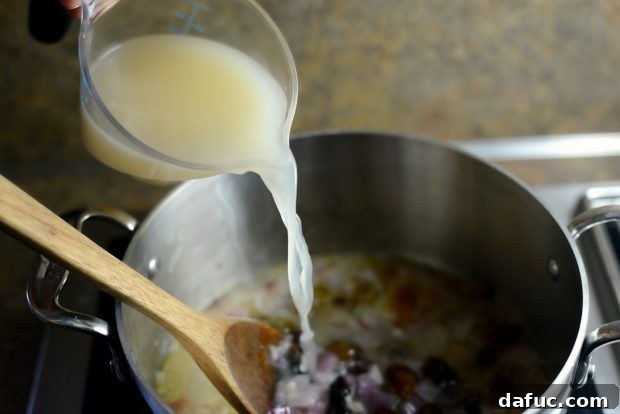Golden Moroccan Quinoa Pilaf 11 Adding Low-Sodium Chicken Broth