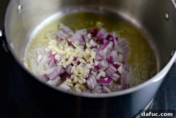 Golden Moroccan Quinoa Pilaf 5 Sautéing Red Onion and Garlic