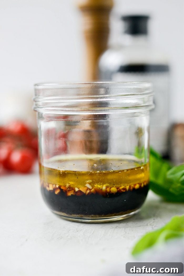Garden Fresh Caprese Pasta 5 Making the balsamic dressing in a jar
