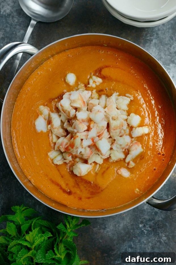 Blending Roasted Tomatoes and Ingredients for a Smooth Curry Soup