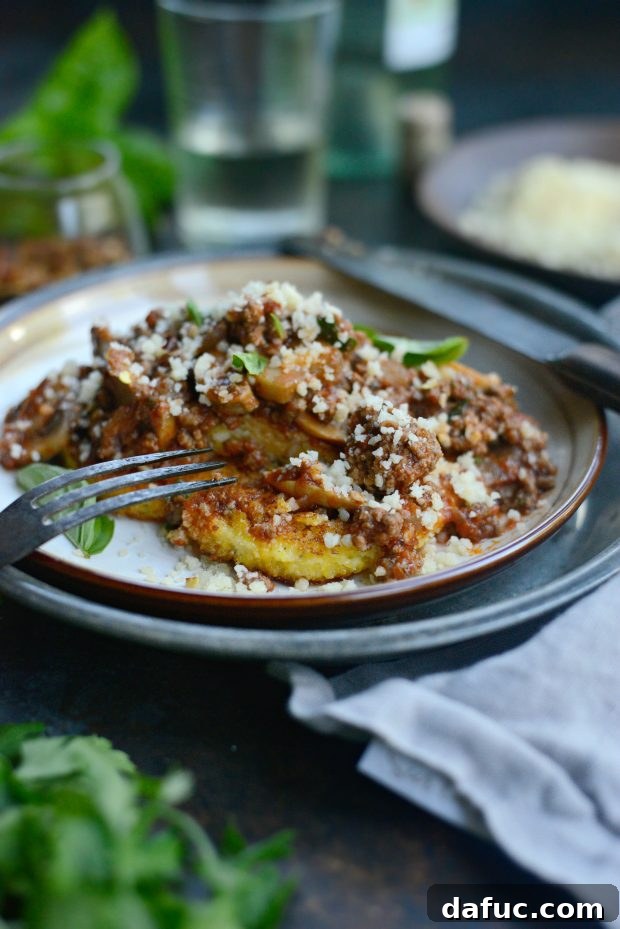 Hearty Beef and Mushroom Ragu on Crispy Golden Polenta 7 Beef and Mushroom Ragu over Fried Polenta